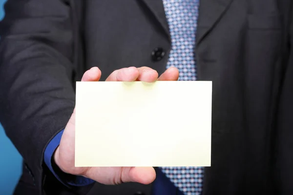 Close up of business note card in male hand — Stock Photo, Image