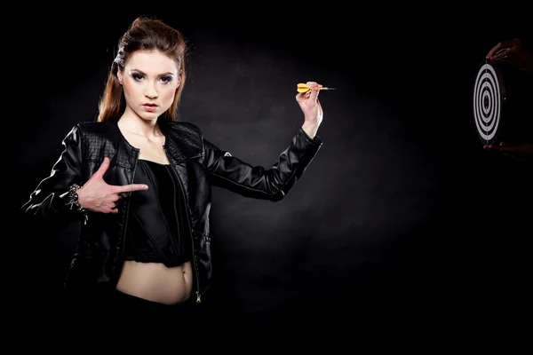Punk girl with dart and target — Stock Photo, Image