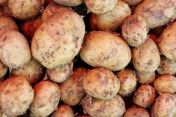 Stapel van aardappelen, aardappelen achtergrond — Stockfoto