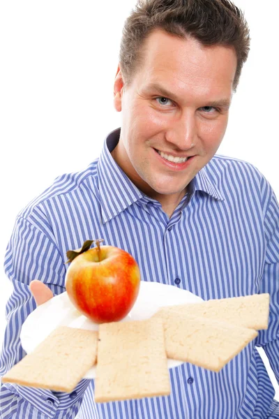 Zdrowy styl życia człowieka jeść pieczywo chrupkie i jabłko — Zdjęcie stockowe