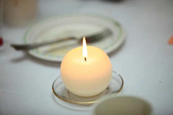 Romantic atmosphere with candle — Stock Photo, Image