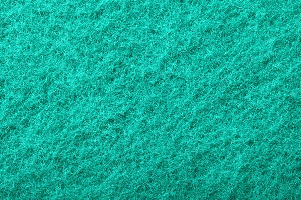 Green abrasive sponge texture background — Stock Photo, Image