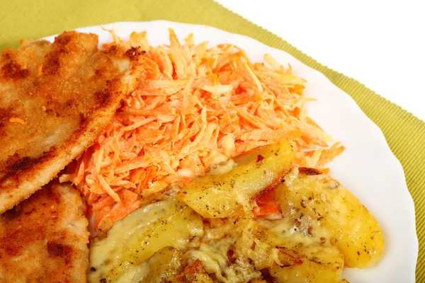 Fried chicken roasted potatos and carrot salad — Stock Photo, Image