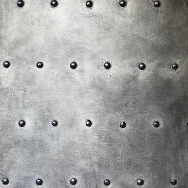Plaque métallique noire ou texture armure avec rivets — Photo