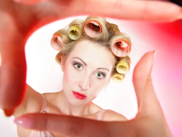 Sexy woman in underwear curlers making frame — Stock Photo, Image