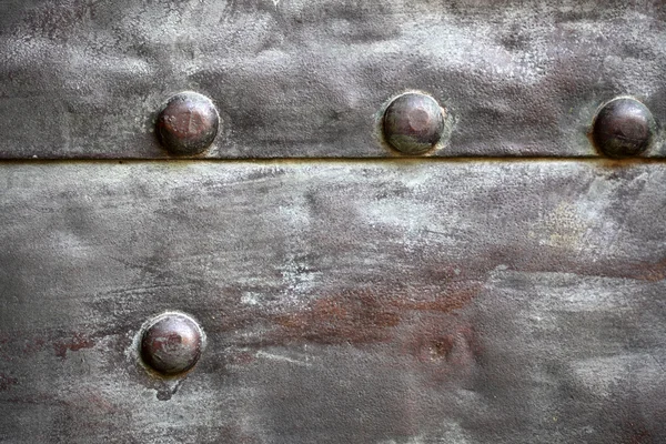 Plaque métallique noire ou texture armure avec rivets — Photo