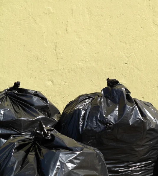 Pile of full black garbage bags — Stock Photo, Image