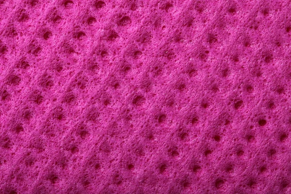 Pink sponge foam as background texture — Stock Photo, Image