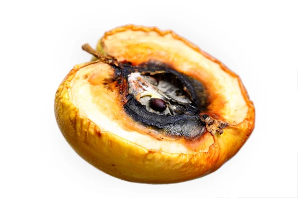 Rotten apple halves isolated. Food waste. — Stock Photo, Image