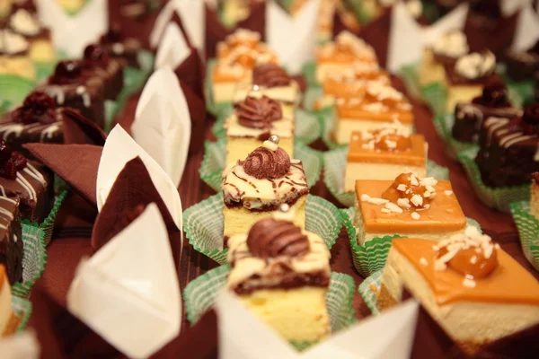 Varieties of cakes desserts catering sweets — Stock Photo, Image