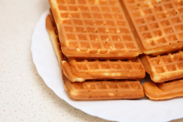 Stack of sweet belgian waffles on plate — Stock Photo, Image
