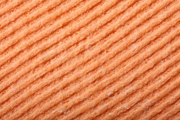 Orange sponge foam as background texture — Stock Photo, Image