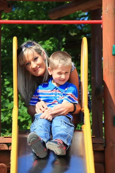 Mother and son together at the playground — Stock Photo, Image