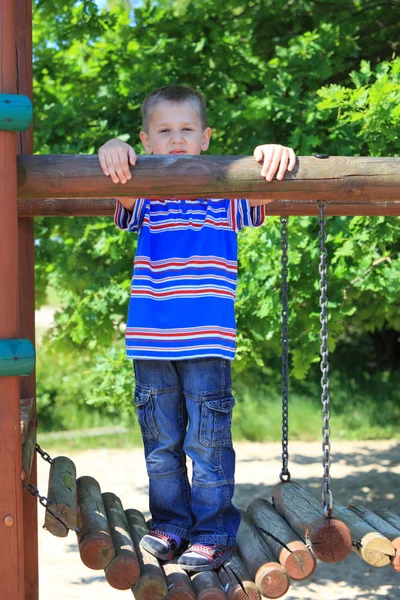 Child boy or kid playing on playground — Stock Photo, Image