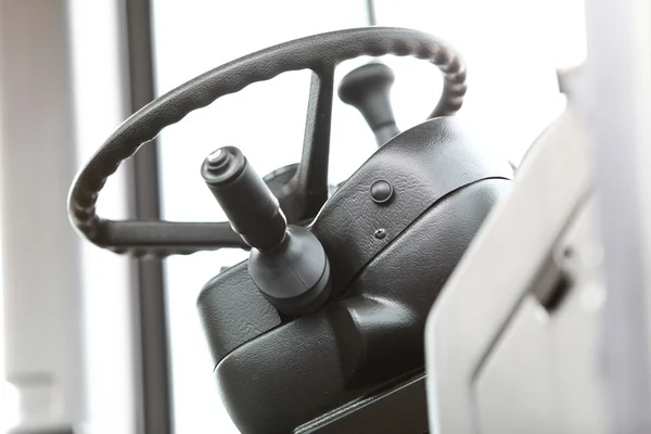 Steering wheel in new industrial machine — Stock Photo, Image