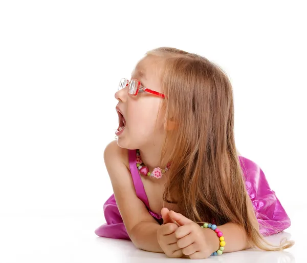 Little girl laying on floor isolated — Stock Photo, Image