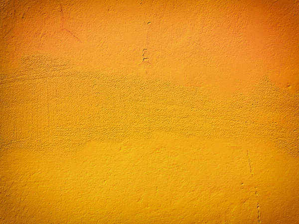 Yellow paint wall background or texture — Stock Photo, Image