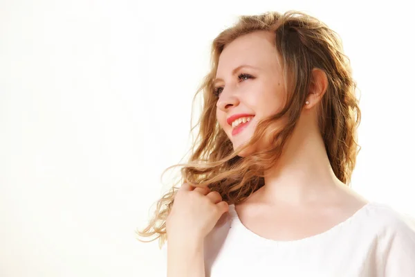 Young woman wind in hair outdoor — Stock Photo, Image