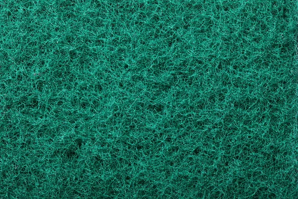 Green abrasive sponge texture background — Stock Photo, Image