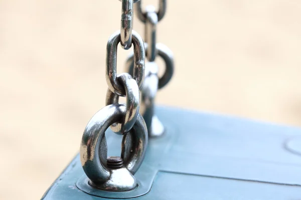 Empty swing set on playground — Stock Photo, Image