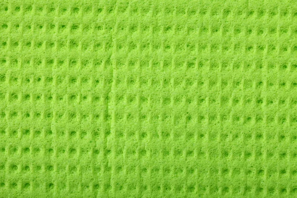 Espuma de esponja verde como textura de fundo — Fotografia de Stock