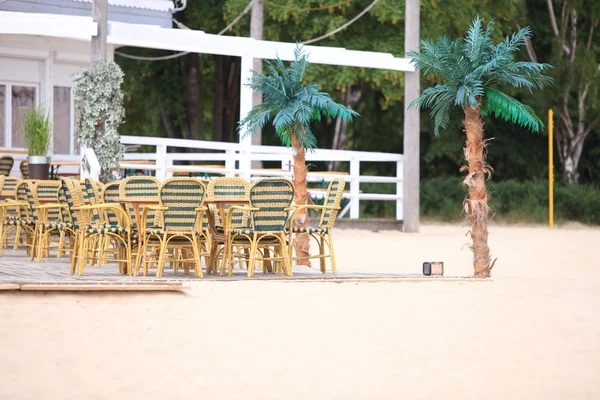 Outdoor restaurant cafe chairs with table — Stock Photo, Image