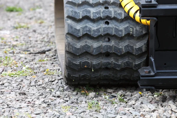 Tracks of small digger excavator — Stock Photo, Image