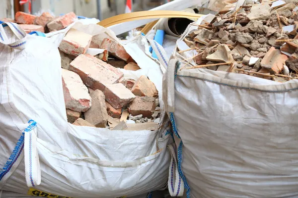 Full construction waste debris bags — Stock Photo, Image