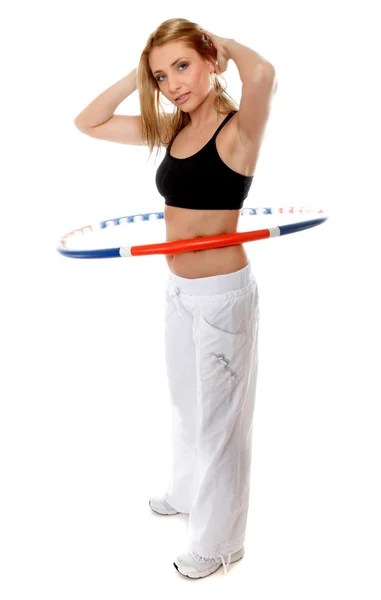 Young fitness woman with hula hoop isolated — Stock Photo, Image