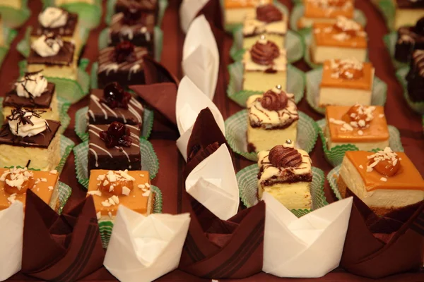 Varieties of cakes desserts catering sweets — Stock Photo, Image