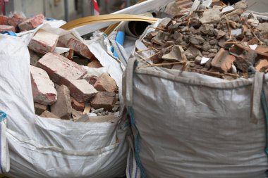 Full construction waste debris bags clipart