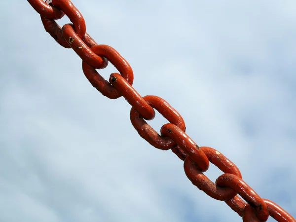 Steel metal chain links segment sky background — Stock Photo, Image