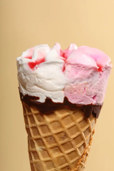 Berry icecream waffle cone on orange — Stock Photo, Image