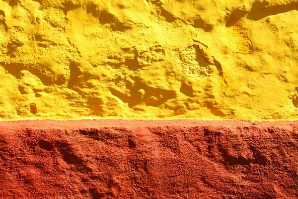 Giallo sfondo della parete vernice rossa o texture — Foto Stock
