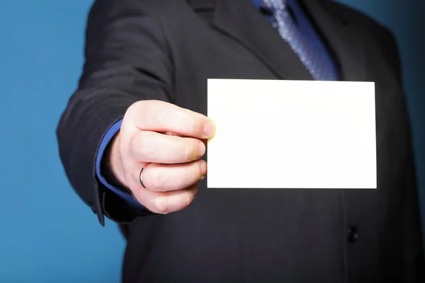 Close up of business note card in male hand — Stock Photo, Image