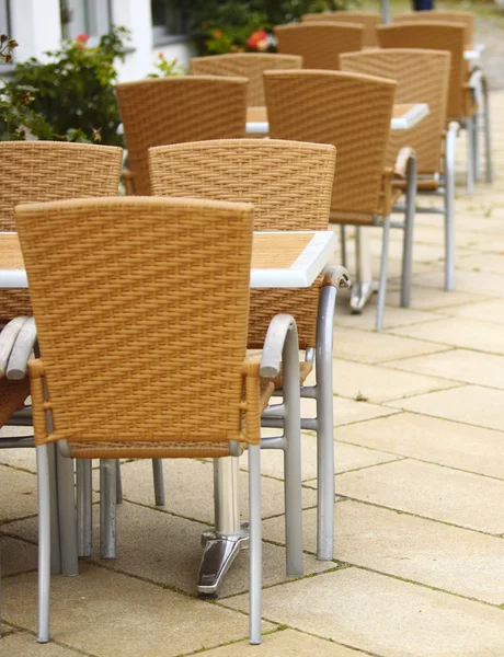 Outdoor restaurant cafe chairs with table — Stock Photo, Image