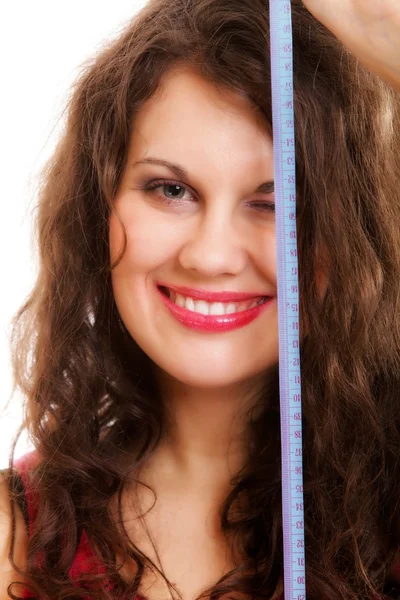 Young sporty fit woman with measure tape — Stock Photo, Image