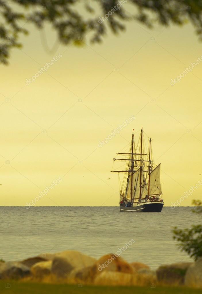Beautiful Sailing Ship On Sea At Dusk Stock Photo Image By C Voyagerix