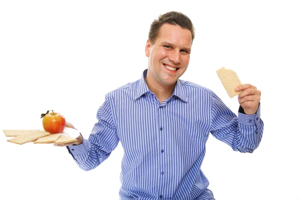 Estilo de vida saudável homem comendo pão crocante e maçã — Fotografia de Stock