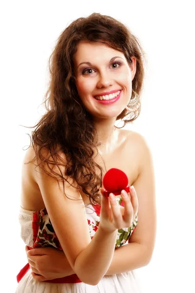 Woman holding a present with engagement ring — Stock Photo, Image