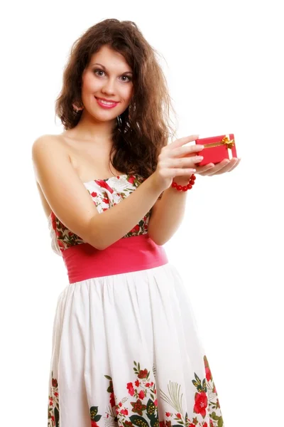 Girl opening small red gift box isolated — Stockfoto