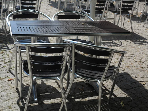 Outdoor restaurant cafe chairs with table — Stock Photo, Image