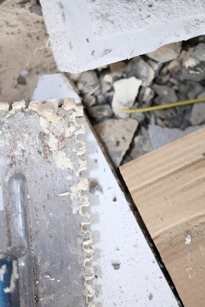 Old dirty trowel on construction site — Stock Photo, Image
