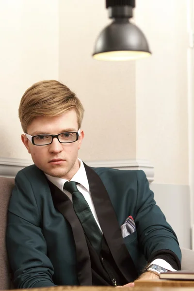 Young handsome stylish man in cafe — Stock Photo, Image