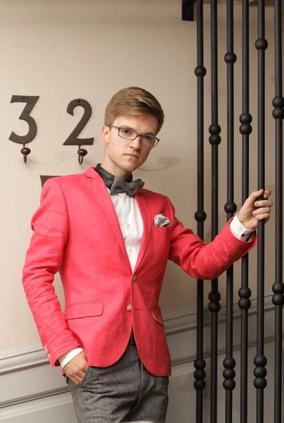 Young handsome stylish man posing indoor — Stock Photo, Image