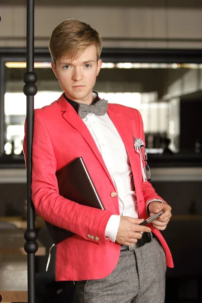 Young handsome stylish man posing indoor — Stock Photo, Image