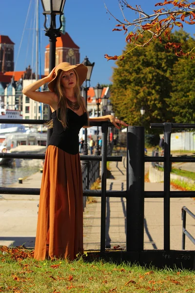 Stylish autumn woman in old town Gdansk — Stock Photo, Image