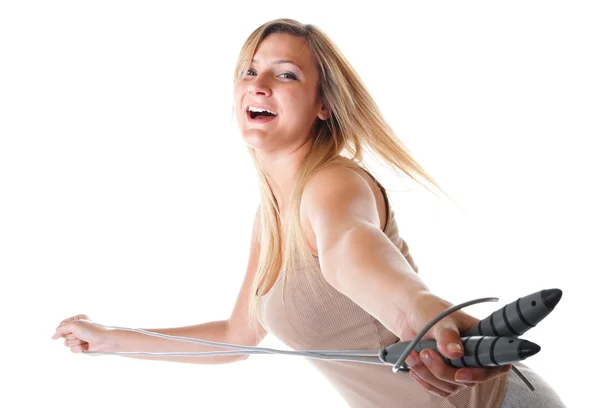 Jeune femme de fitness avec corde à sauter isolé — Photo