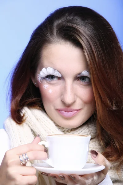 Winter makeup woman with cup of hot latte coffee — Stock Photo, Image