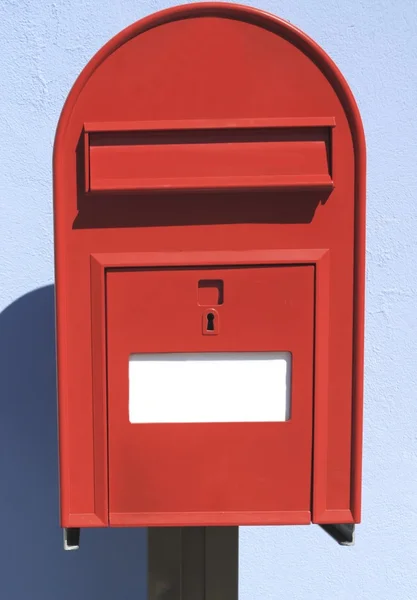 Red postbox letterbox on the street — Stock Photo, Image